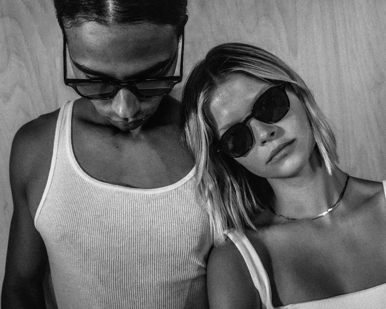 Couple wearing horn rimmed sunglasses - photo credit GLCO