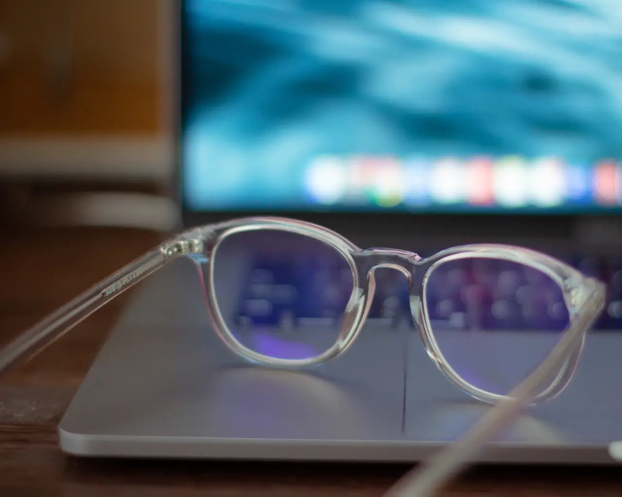Glasses on laptop computer