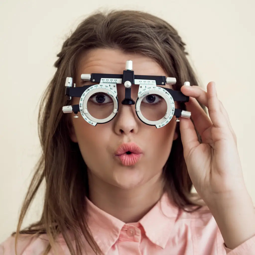 Model simulating an eye exam at The Optical Co