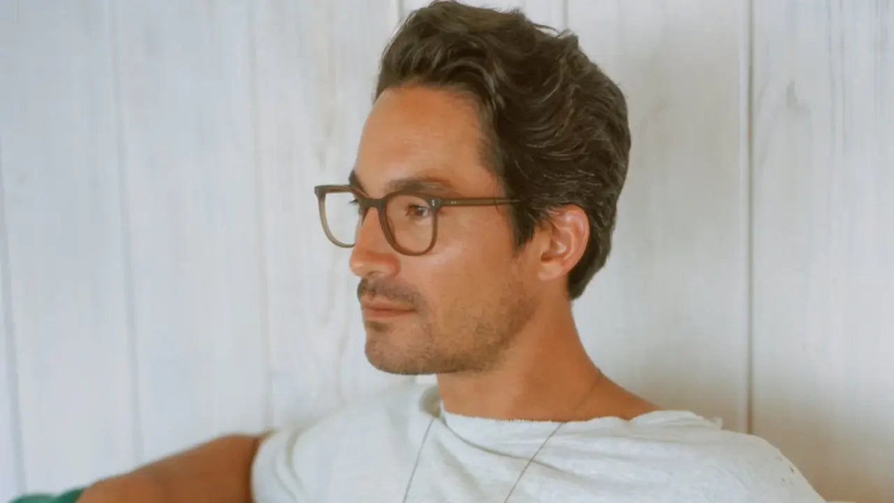 Model wearing wide fit eyeglass frames by GLCO