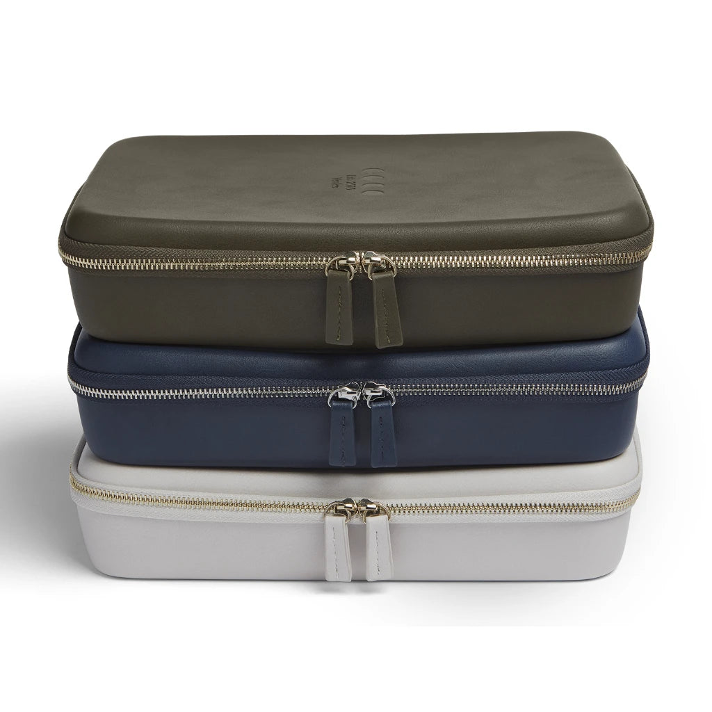 luxury GLCO collector travel eyeglass case luggage stacked