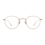 Champagne classic round metal prescription eyeglasses by Garrett Leight at The Optical. Co