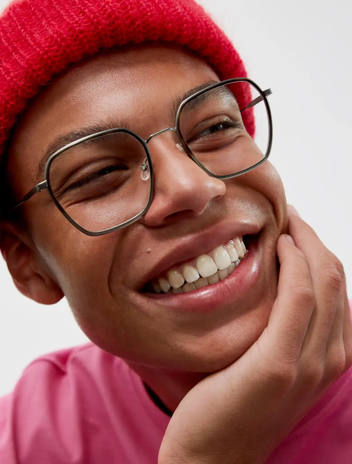 Happy person wearing Andy Wolf glasses purchased from The Optical Co online