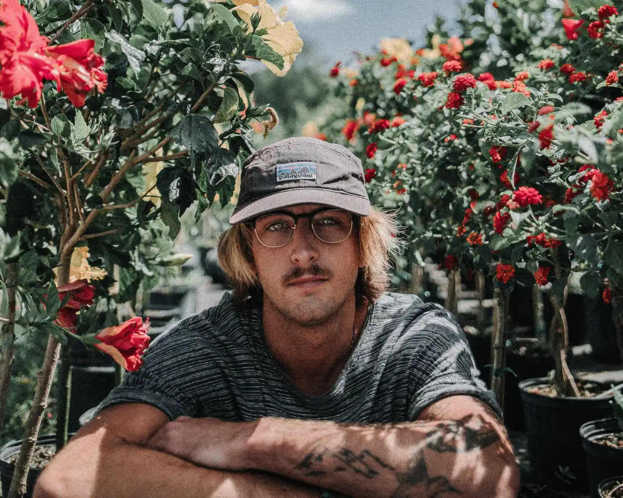 Model in a rose garden - photo credit Seth Doyle
