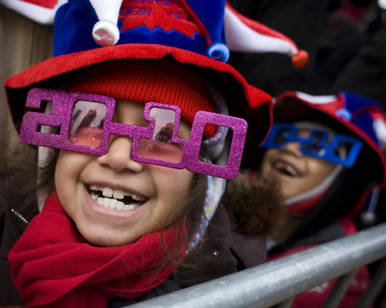 Happy kid wearing New Years Eve glasses in 2010