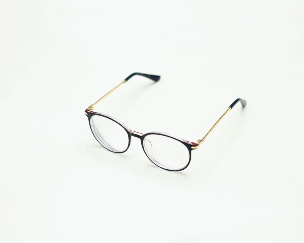 Eyeglasses on a white plain table