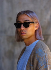 Model wearing Ace wayfarer plastic sunglasses by GLCO for men and women