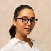 Model wearing Garrett Leight bold square plastic eyeglass frames for men and women
