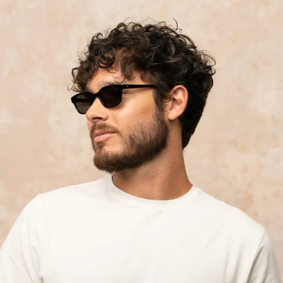 Model wearing Black Chaparral cat-eyed plastic sunglasses for women by GLCO