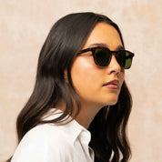 Model wearing square plastic Verduga sunglasses by GLCO