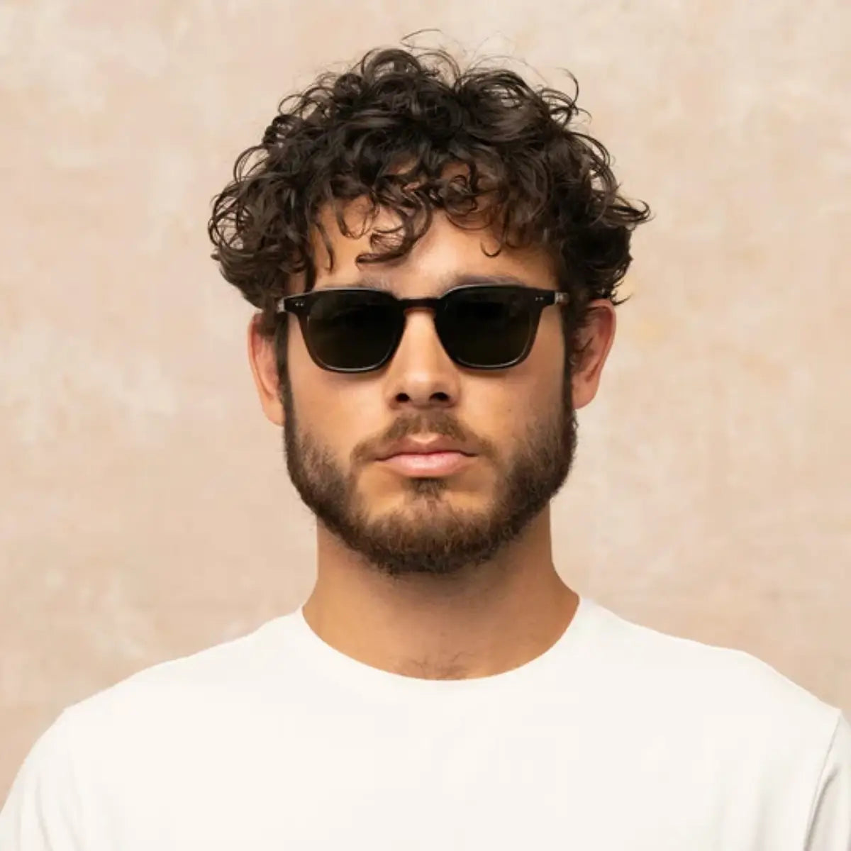Model wearing square plastic Verduga sunglasses by GLCO